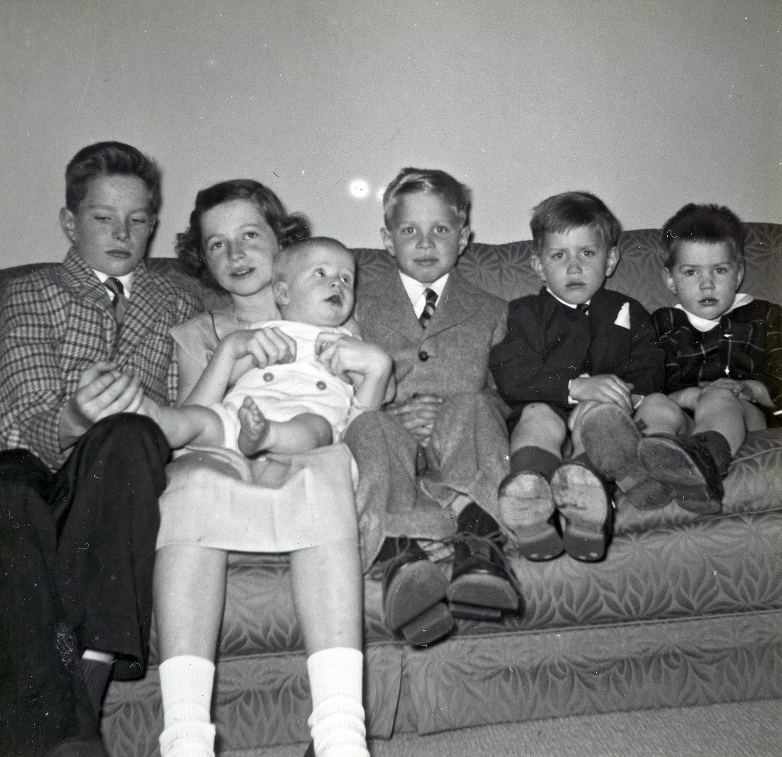The family has just moved from an apartment in the Bronx to a house in Riverdale, New York City. Seen here are (left to right) Thomas, Rita, baby Vincent, Matthew, Peter, and Chris, 1952.