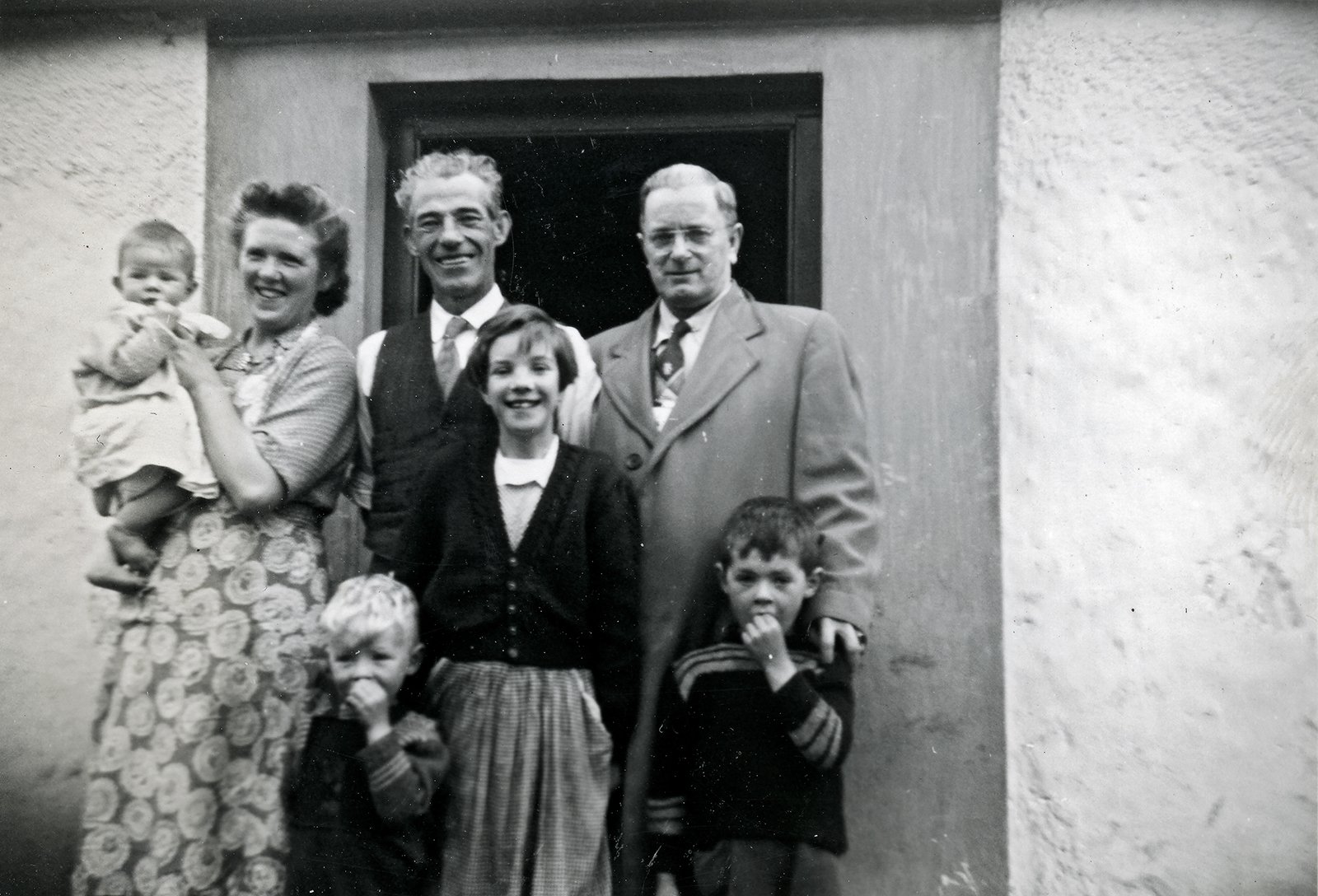 Beth's Grandfather Patrick Joseph McNally (r) with McAtasney or McNally family. Lurgan, N. Ireland June-July, 1954