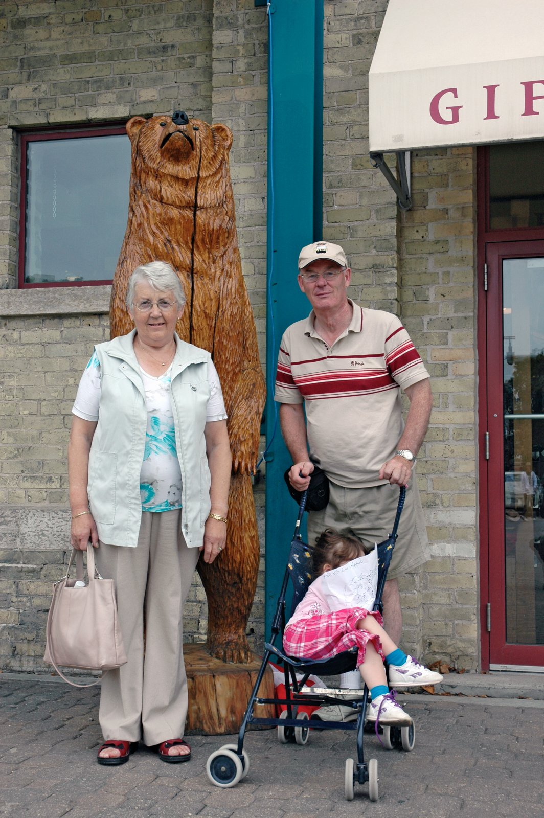 Sophie with her grandparents at The Forks, Winnipeg.