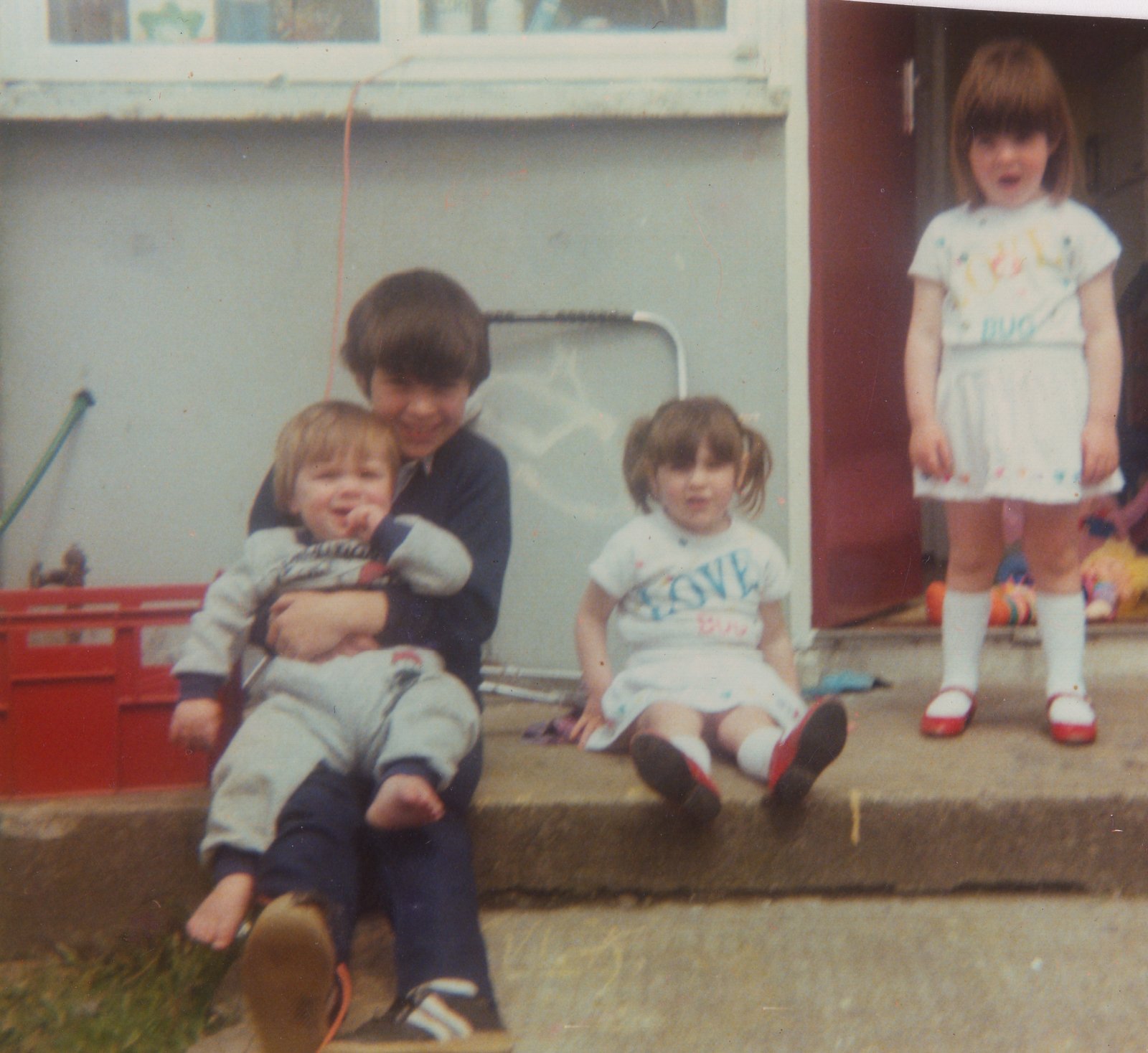 Siblings Gary, Alan, Tracy and Lisa Crowne as children, 1986. 