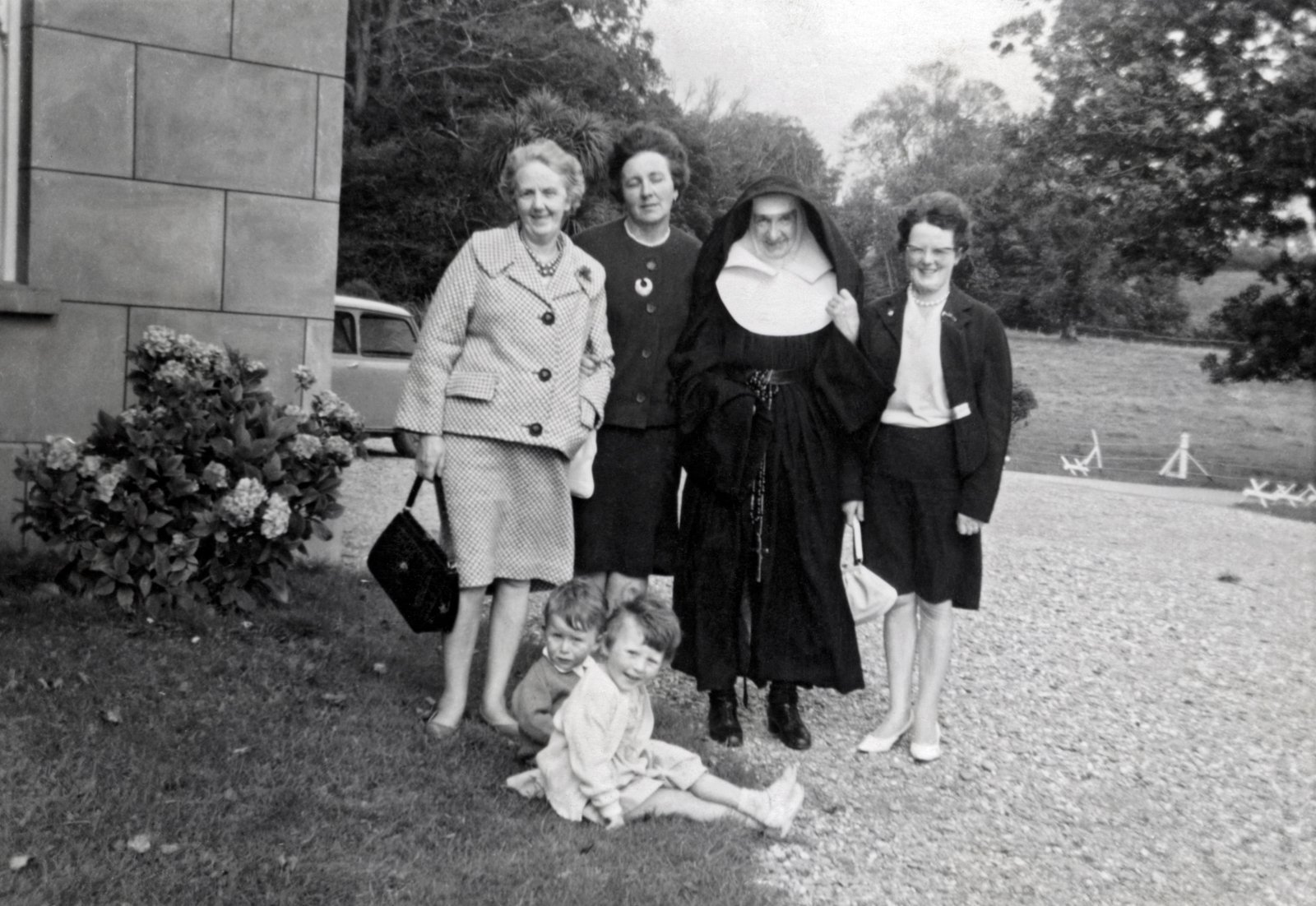 Dillon family group visiting Sister Anne Dillon in Clonakilty, West Cork in the early 1960s.