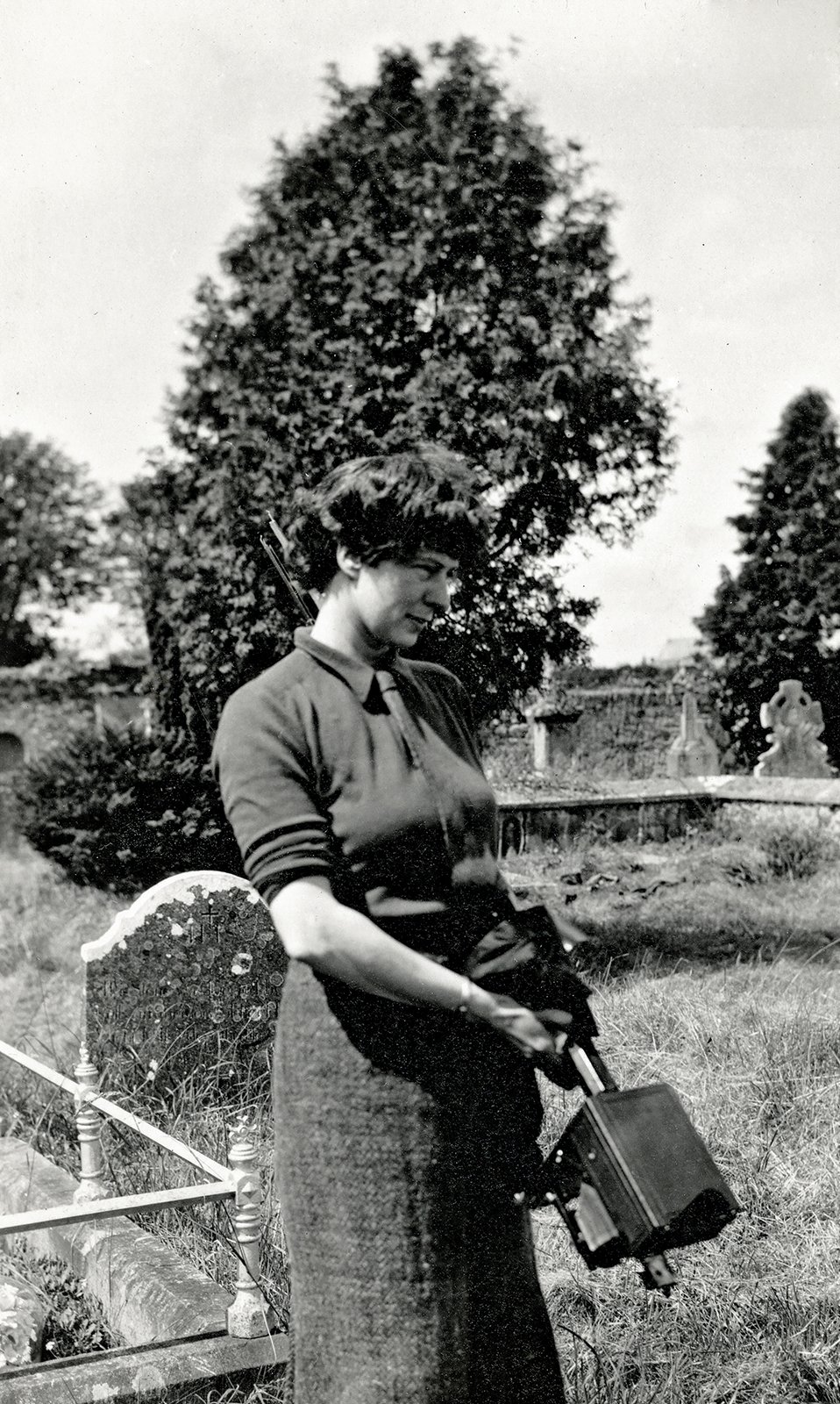 Helen Hooker O'Malley with camera on one of her photographic trips around Ireland, 1938.