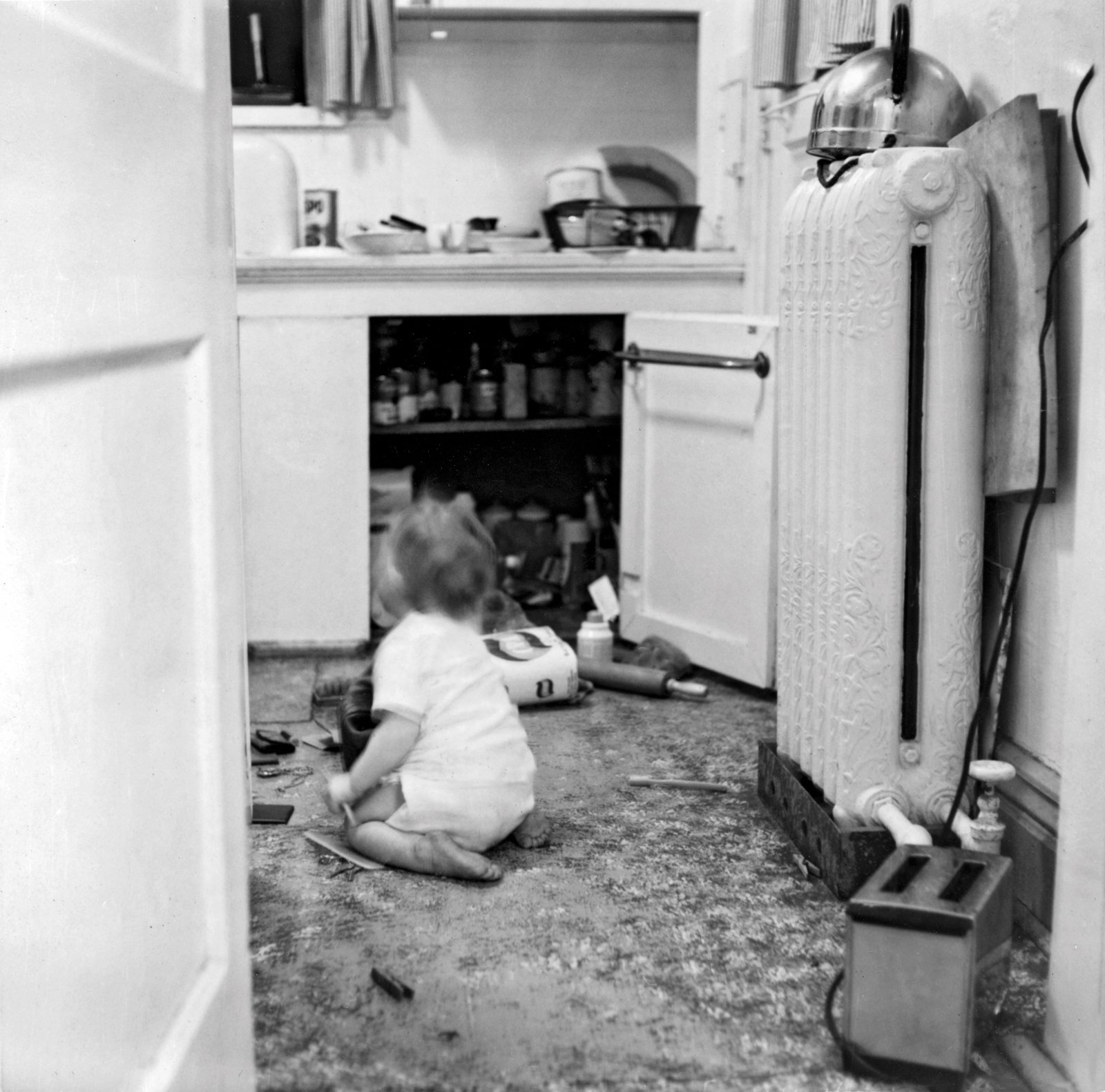 Deirdre in the kitchen of her parent’s house, 21 Brookmount Road, Toronto.