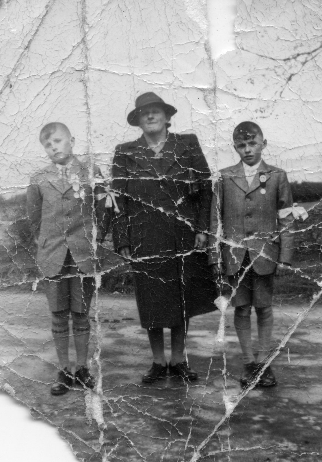 Mother Margaret Scully (neé Egan from Clare) with her sons John (L) and Matt (R) who were making their First Holy Communion.